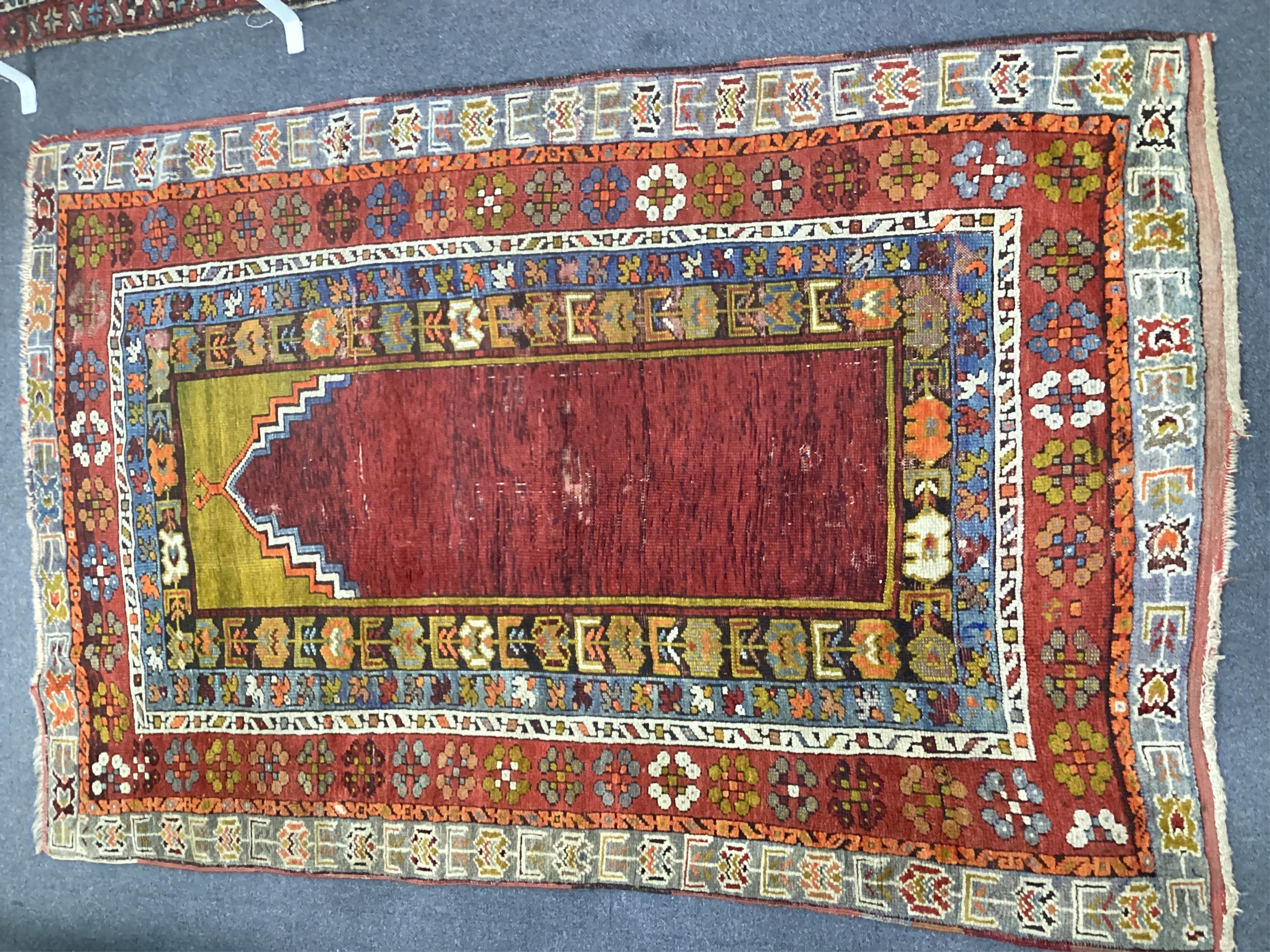 A Turkish prayer rug, 170 x 116cm. Condition - poor